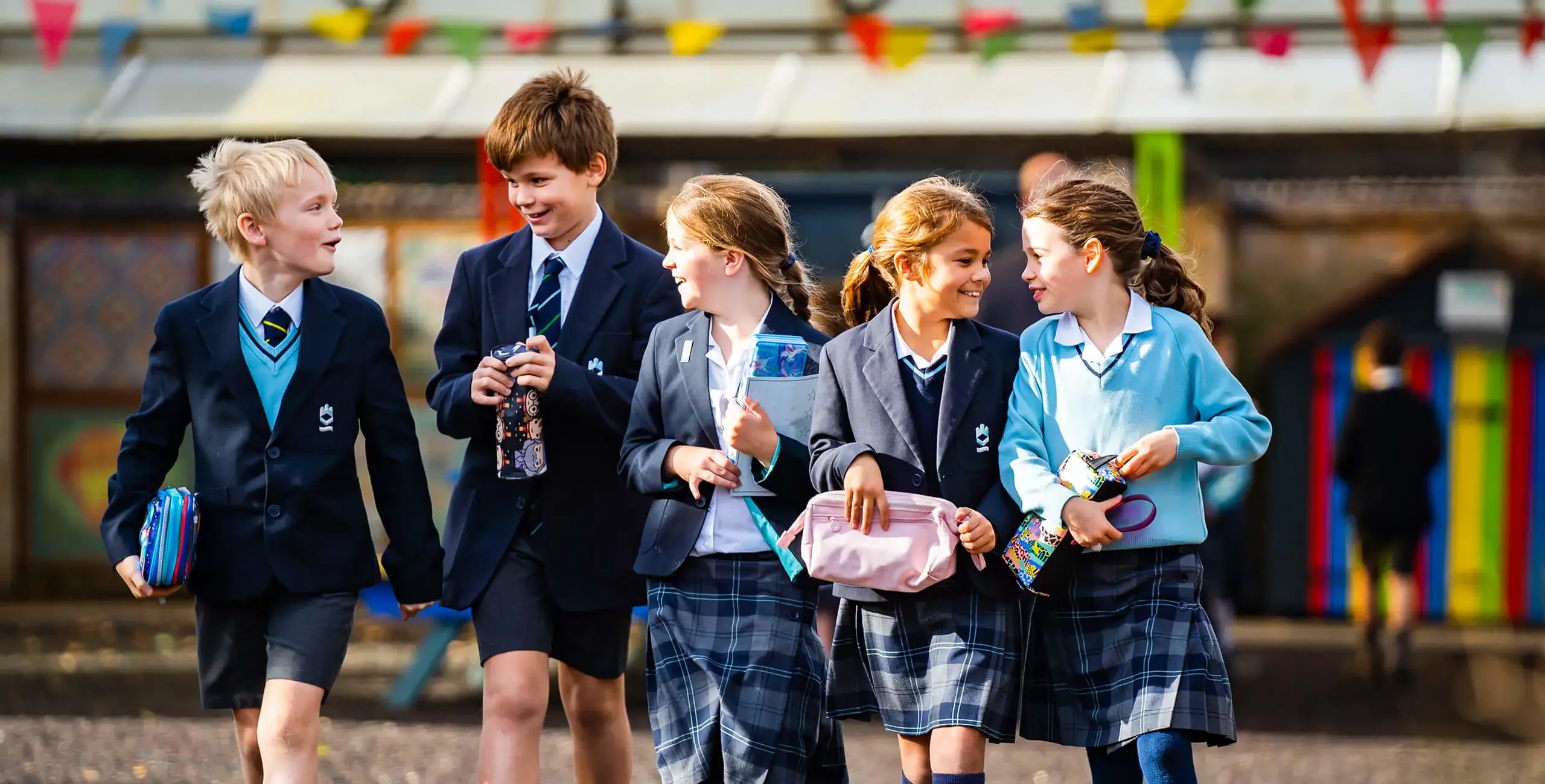 Prep children walking together in the school grounds